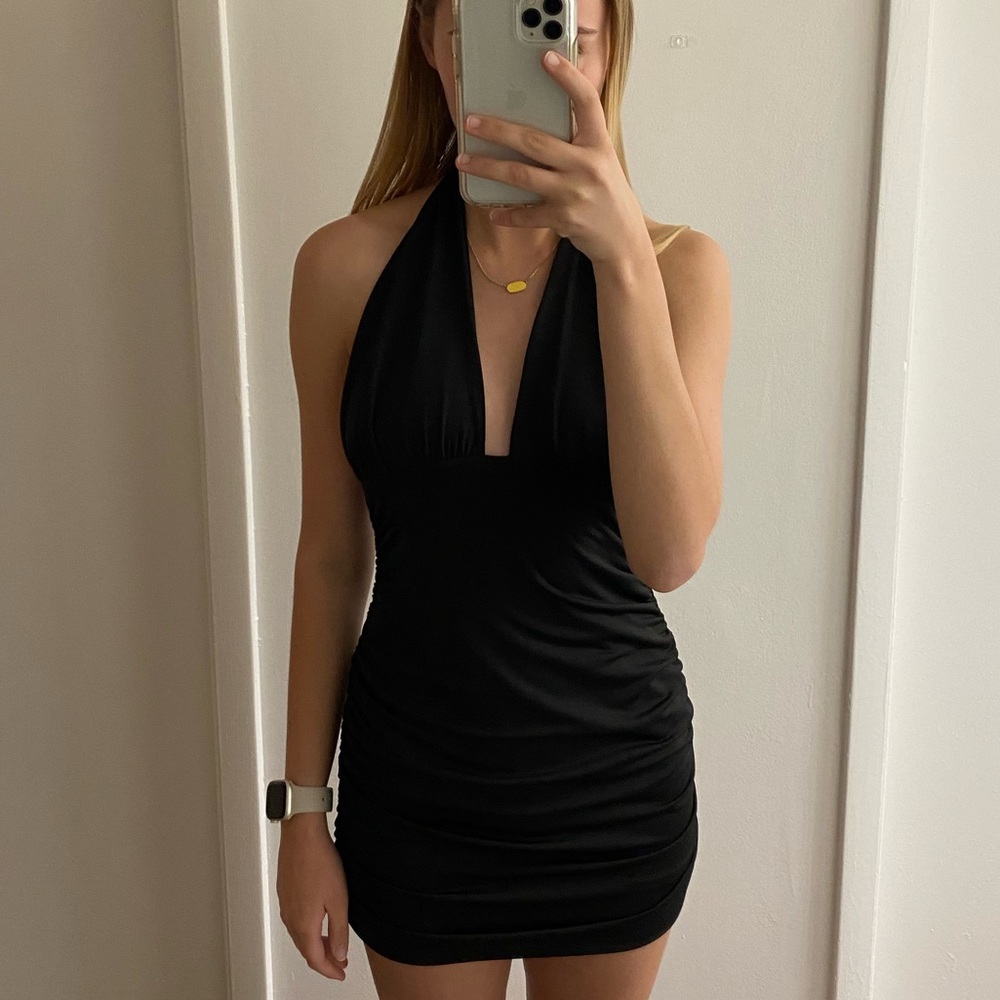 Black cocktail dress. Halter top. Size XS